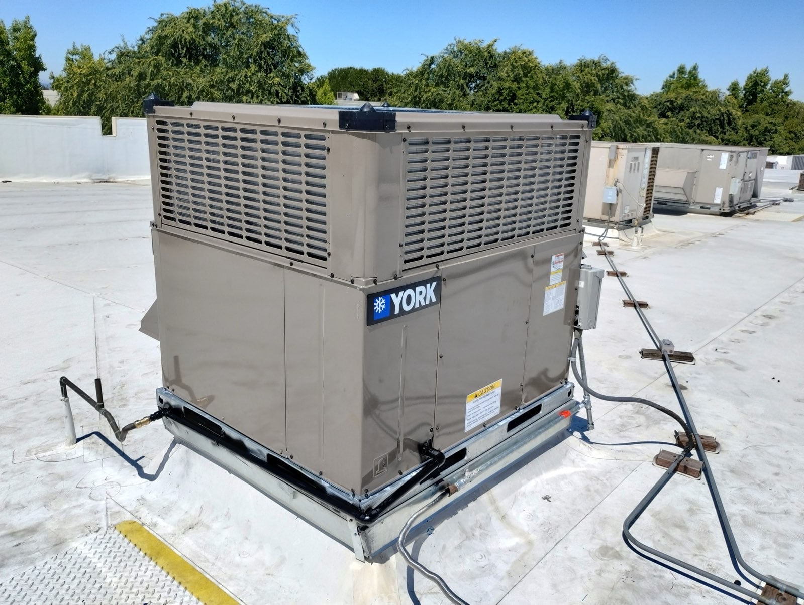 Brand new York unit mounted on curb by Cohen Air