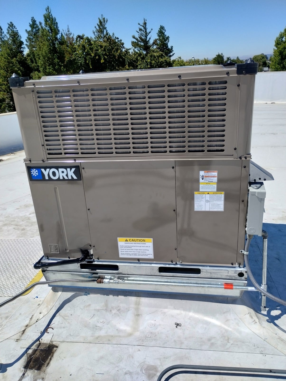 York rooftop HVAC unit installed by Cohen Air on a commercial flat roof